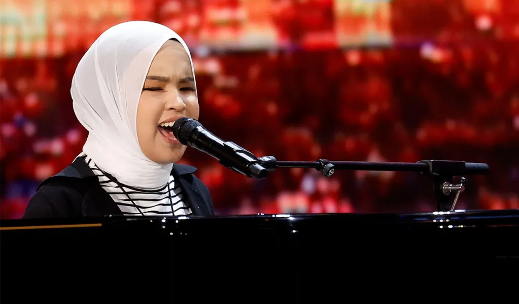 GOLDEN BUZZER! Simon Cowell Asks Blind Singer Putri Ariani to Sing SECOND SONG on AGT 2023!
